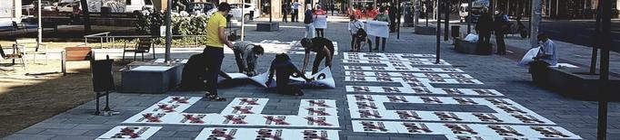 Acció sorpresa d'Òmnium a la plaça Pau Casals